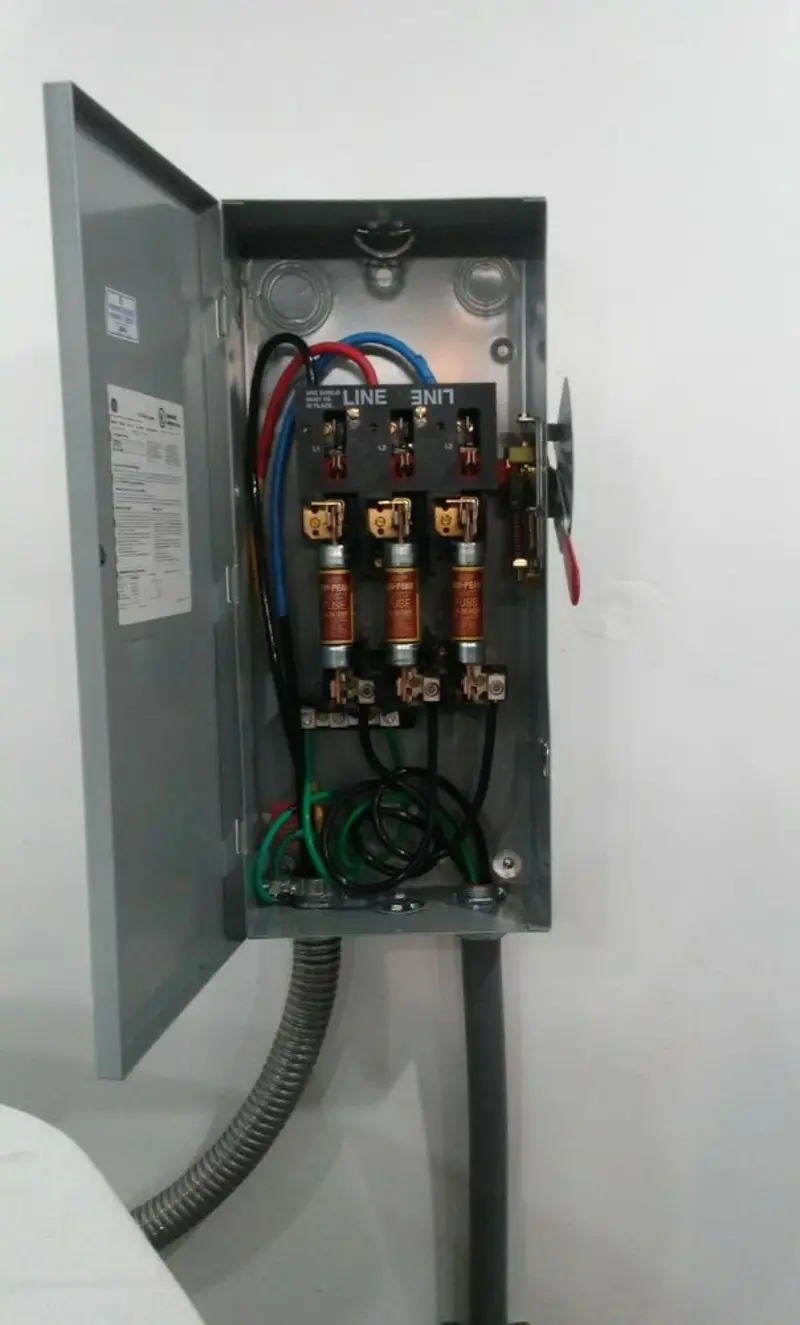 Three-phase disconnect switch installed for Smoke Detector Installation in Plains