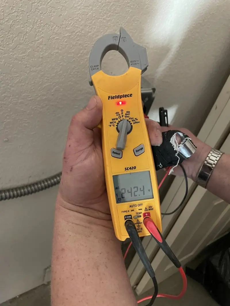Voltage testing with clamp meter during Generator Installation in Plains